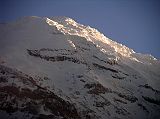 Ecuador Chimborazo 05-01 Estrella del Chimborazo Chimborazo Main Summit Close Up At Sunrise When we awoke early the next day, the mists had cleared and Chimborazo shone beautifully in the early morning sun from the Estrella del Chimborazo. Here�s a close up of glaciers and the Whymper (6310m, Main) summit of Chimborazo at sunrise.